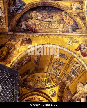 Venice, Italy - May 21, 2017: Entrance to St Mark`s Basilica or San Marco. It is top landmark of Venice. Inside the famous old St Mark`s cathedral. In Stock Photo